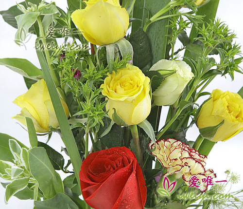 vase of red roses, yellow roses and yellow carnations