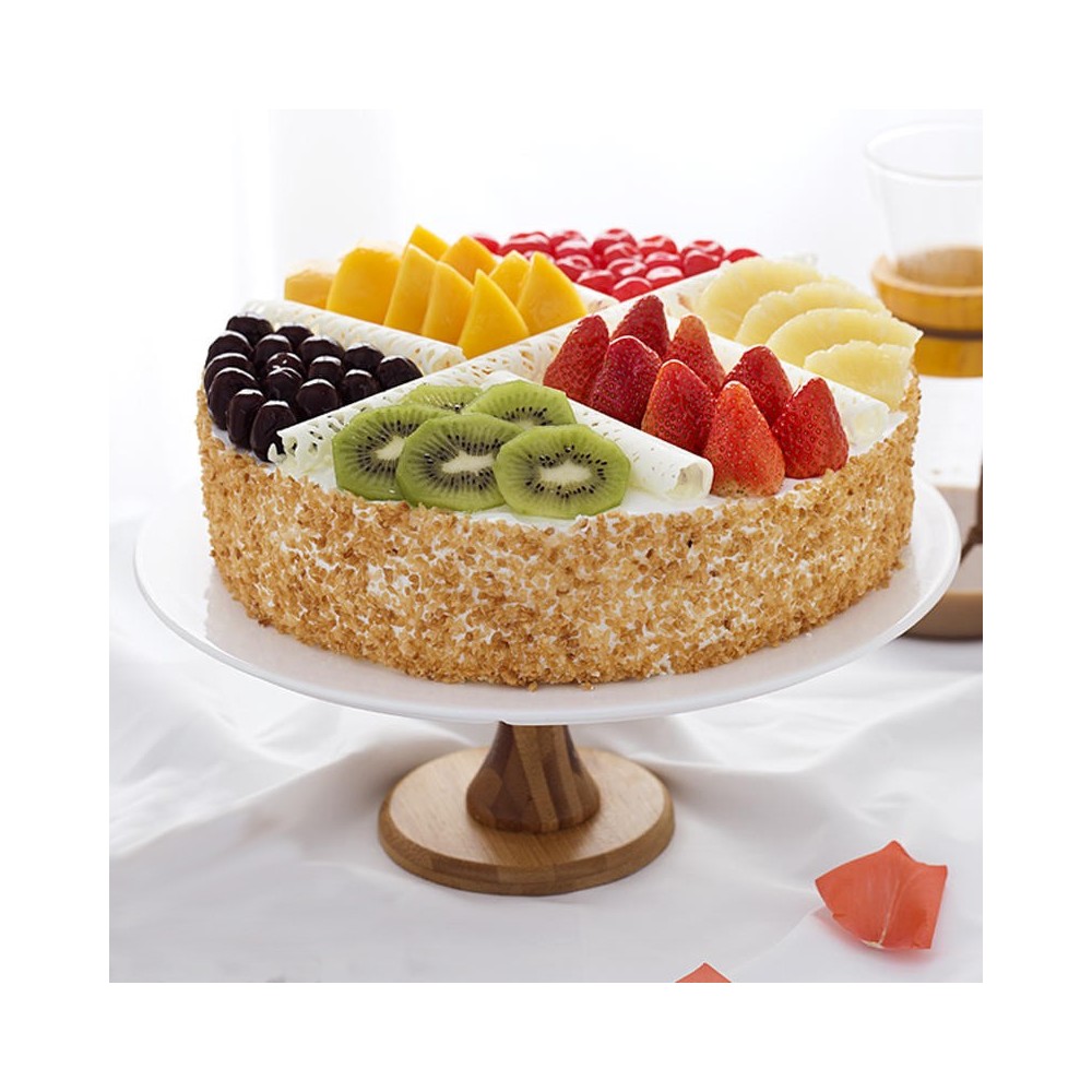 Gâteau d'anniversaire multi-fruits de forme ronde