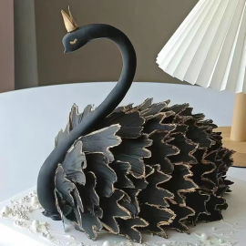 Black swan birthday cake