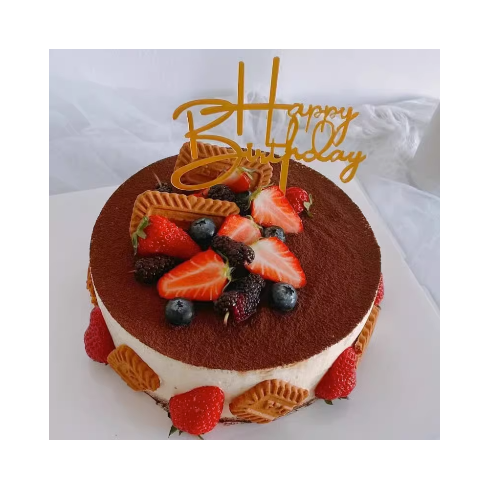 Tiramisu mousse birthday cake with strawberries, blueberries and biscuits