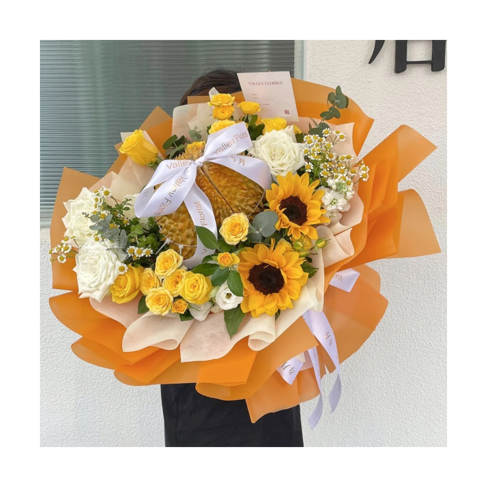 Le bouquet de durian et de fleurs