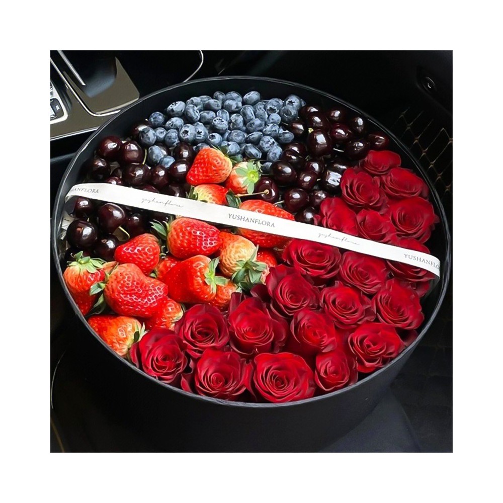 Caixa de presente redonda com frutas e flores « Presente delicioso »