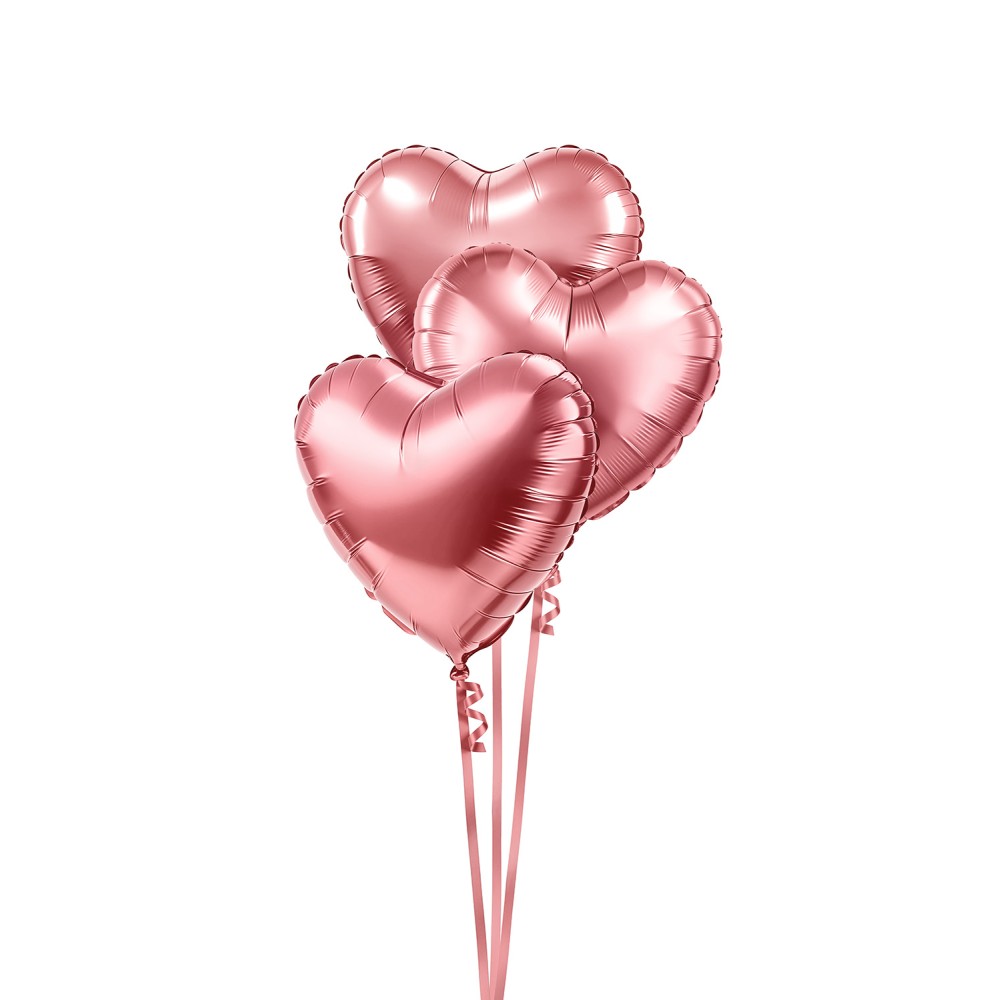 Globos metálicos de color rosa brillante con forma de corazón Globos metálicos de color rosa brillante con forma de corazón