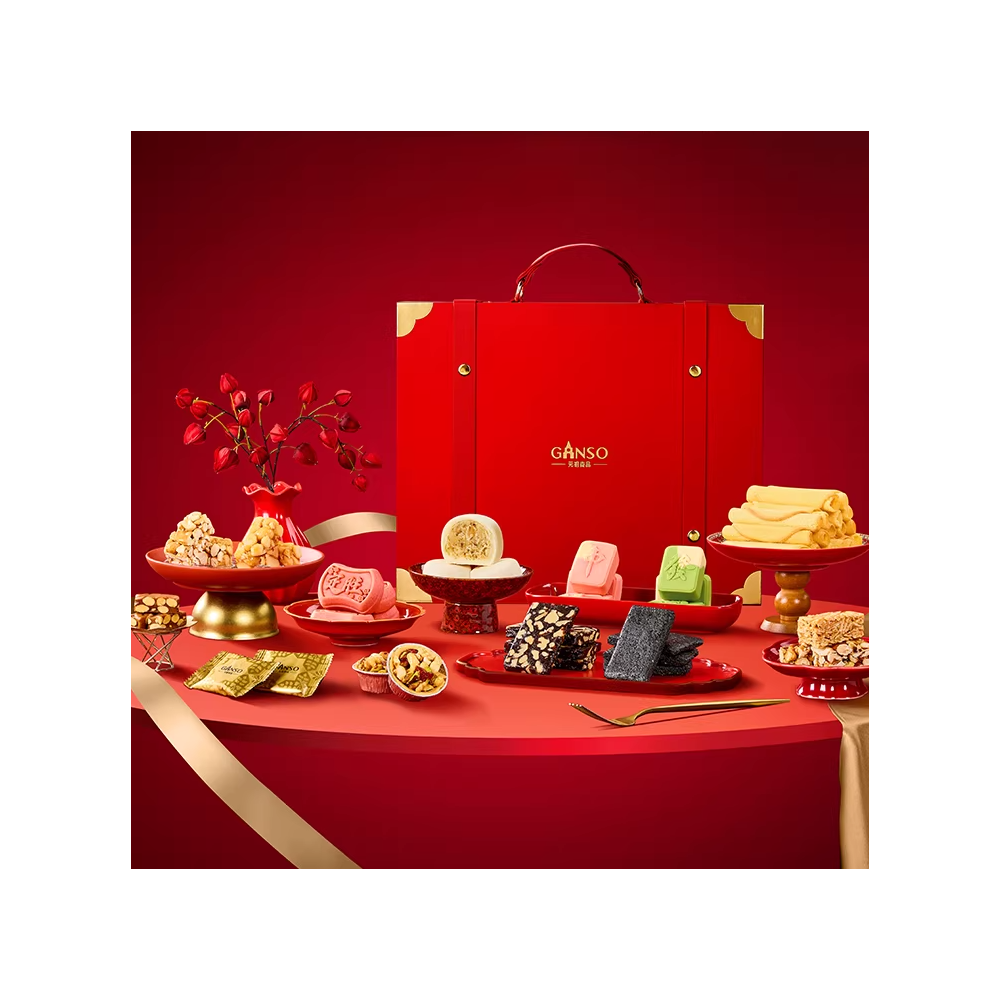 Caixa de presente premium em formato de mala vermelha com sortimento de snacks para o Ano Novo Chinês Ganso