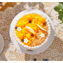 Pastel de frutas y mango con crema fresca Ganso