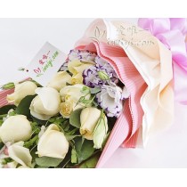 11 champagne roses, accented by snapdragons, white & purple lisianthus and fresh greens