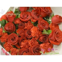 16 premium red roses and 14 red carnations, accented with fresh greens.