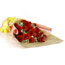 Bouquet of red roses and white spray carnations
