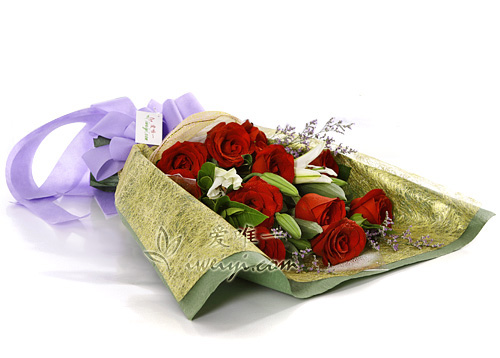 bouquet de roses rouge et de lys blanc