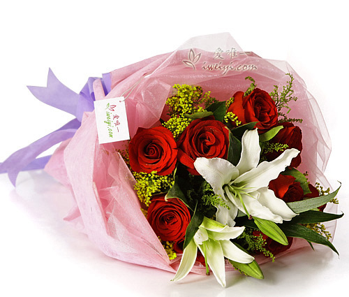 Bouquet of red roses and white lilies