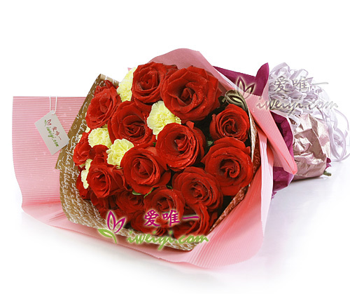 bouquet de roses rouges et d'oeillets jaunes