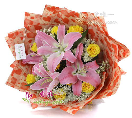 bouquet of yellow roses and pink lilies