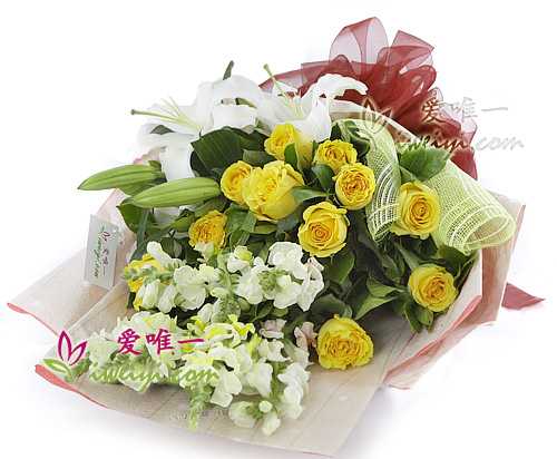 bouquet of yellow roses, white lilies and white snapdragons